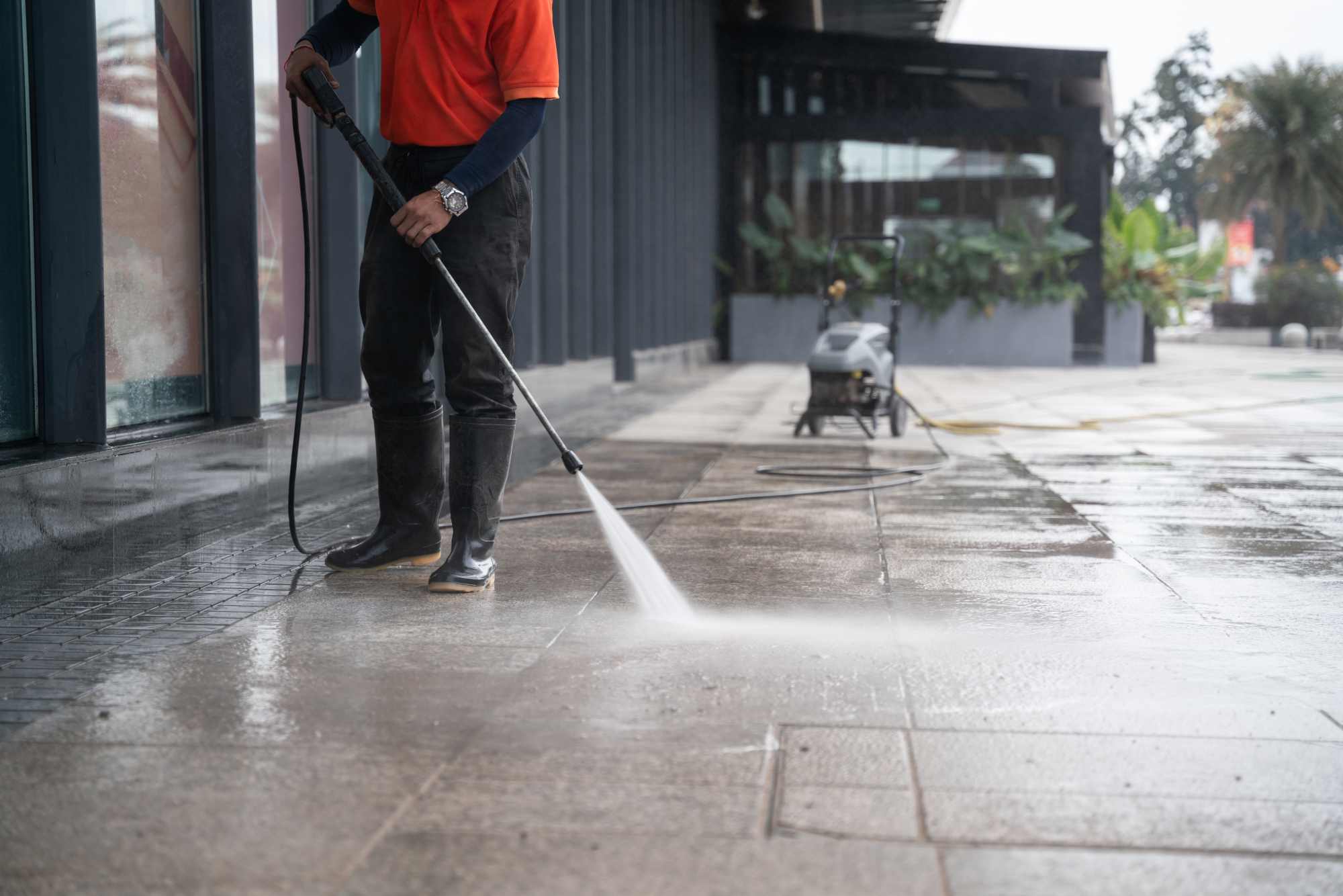 Pressure cleaning a commercial walkway